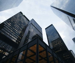 low angle photo of city high rise buildings during daytime